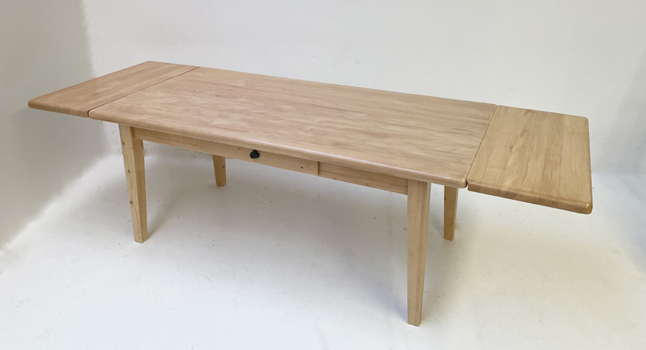 Vierfußtisch Nürnberg 90/180 Fichte mit Schubladen, 2 Ansteckplatten 40 cm , mit Konterprofil